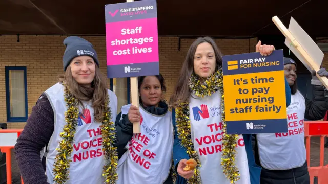 Nurses striking outside St Mary's Hospital in London