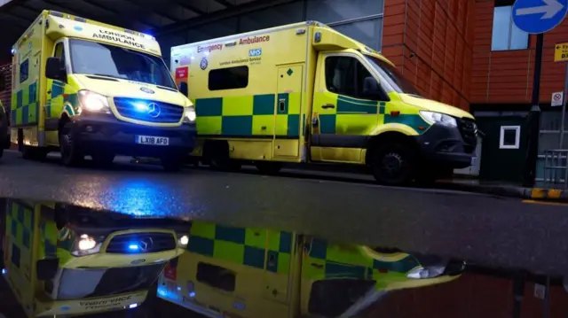 Ambulances are seen near The Royal London Hospital in London