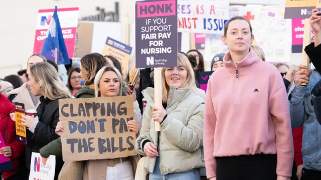 Members of the Royal College of Nursing (RCN) on the picket line outside St Thomas' Hospital in London