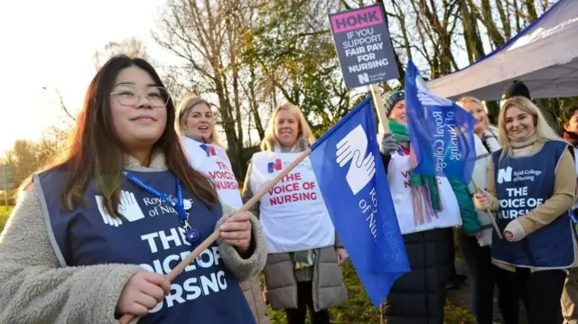 Nurses on strike in a dispute over pay and working conditions