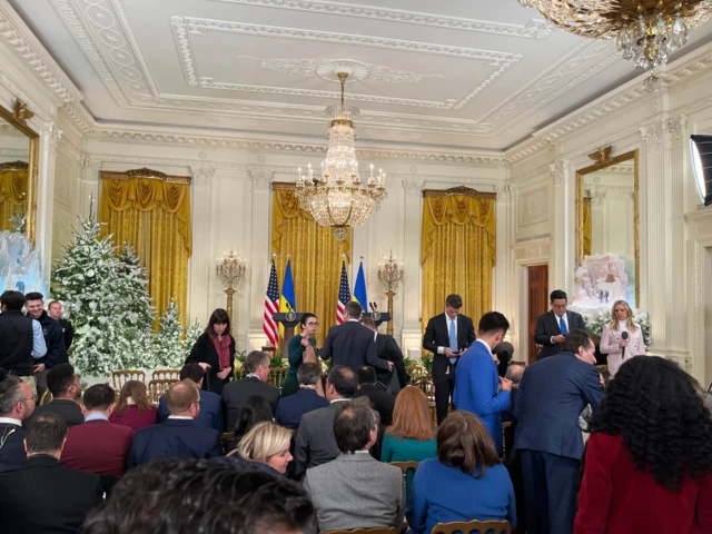 Reporters in the East Room