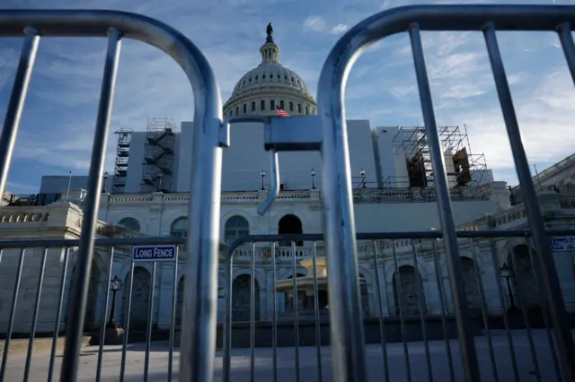 Barricades mark the limit of the public access areas on the West Front of the US Capitol