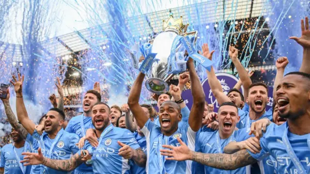 Manchester City celebrate winning the Premier League title