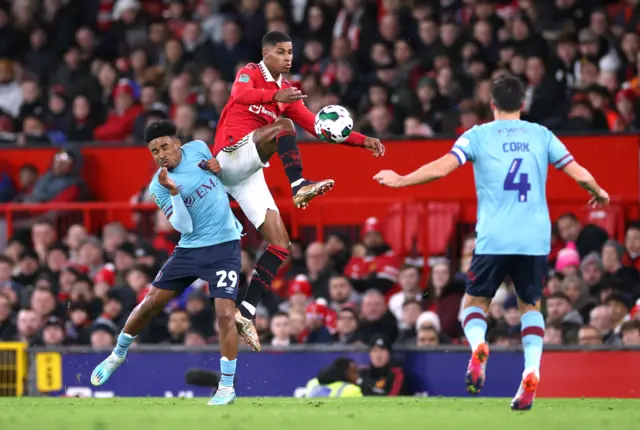 Manchester United's Marcus Rashford in action with Burnley's Ian Maatsen