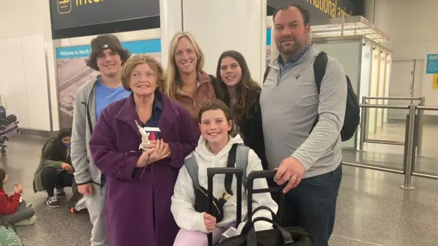 Adam Brill and his family at Gatwick airport in London