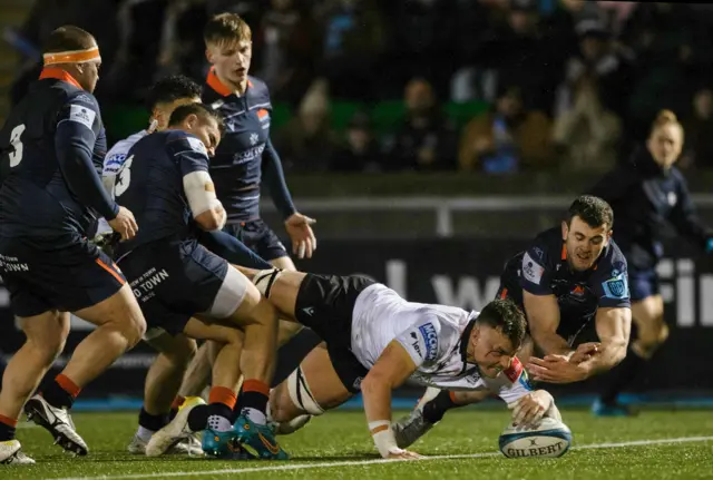 Jack Dempsey scores the game's first try