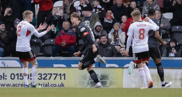 Mark O'Hara celebrates after converting St Mirren's second penalty of the day