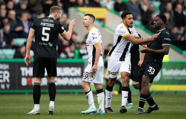 Ryan Porteous points at Jason Holt after the Livingston midfielder's red card challenge