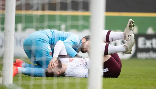 Craig Halkett was forced off with a knee injury after only three minutes