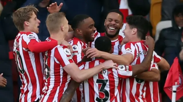 Brentford celebrate with Ivan Toney