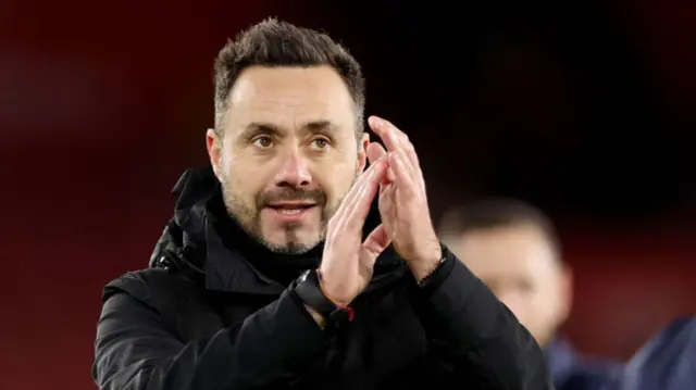 Roberto de Zerbi applauds Brighton fans after the win at Southampton