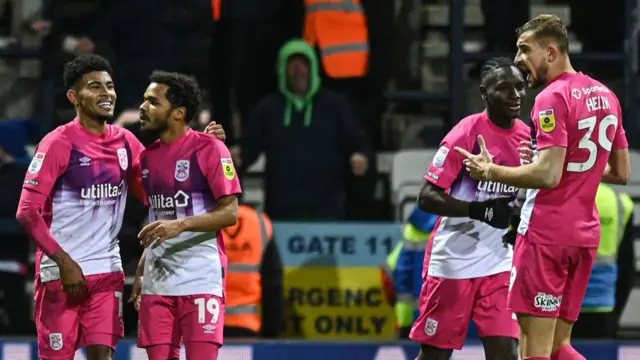 Huddersfield celebrate going in front at Preston