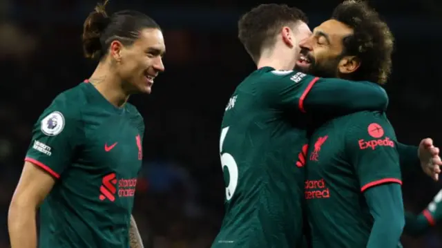 Darwin Nunez, Andy Robertson and Mo Salah celebrate