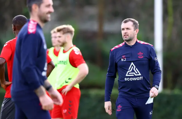 Nathan Jones watches Southampton train