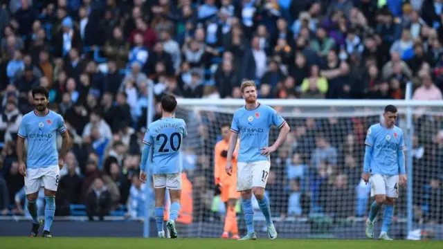 Manchester City players after conceding against Brentford