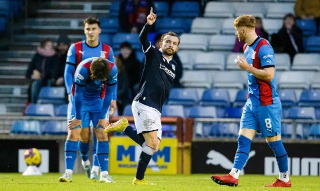 Paul McMullan celebrates