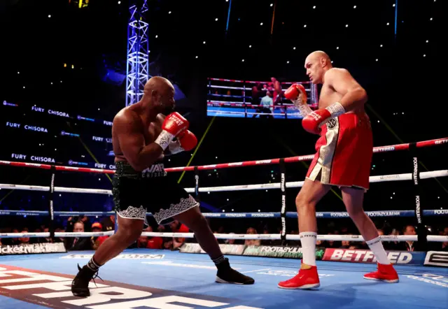 Derek Chisora and Tyson Fury in the ring