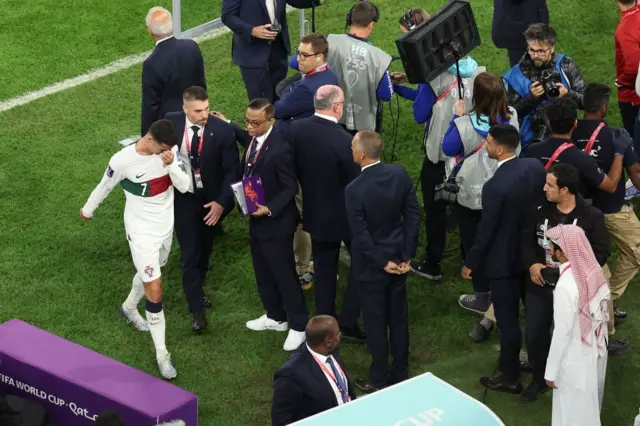 Cristiano Ronaldo (left) after Portugal's World Cup exit in Qatar