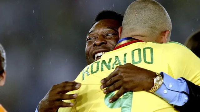 2002 Soccer World Cup 2002. Final: Brazil vs Germany. Brazil's Pele and Ronaldo hug each other after their victory