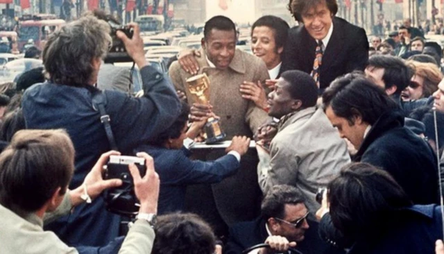 Pele with the Jules Rimet trophy