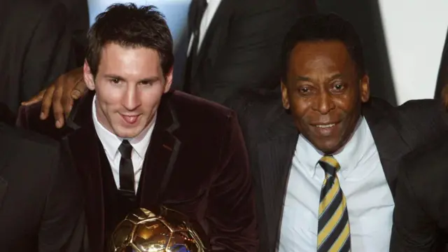 Lionel Messi of Argentina (L), FIFA World Player of the Year holds his FIFA Ballon d'Or 2011 trophy next to Pele during the FIFA Ballon d'Or 2011 soccer awards ceremony at the Kongresshaus in Zurich January 9, 2012.