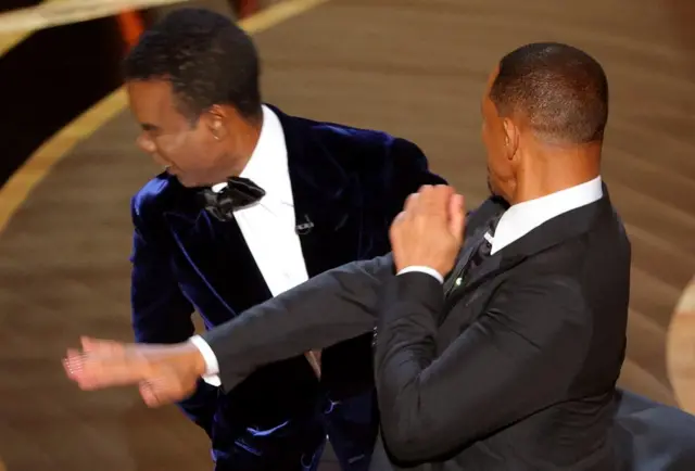 Will Smith hits Chris Rock during the 94th Academy Awards in Hollywood, Los Angeles, on 27 March 2022.