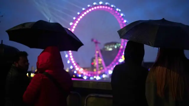 Umbrellas on embankment