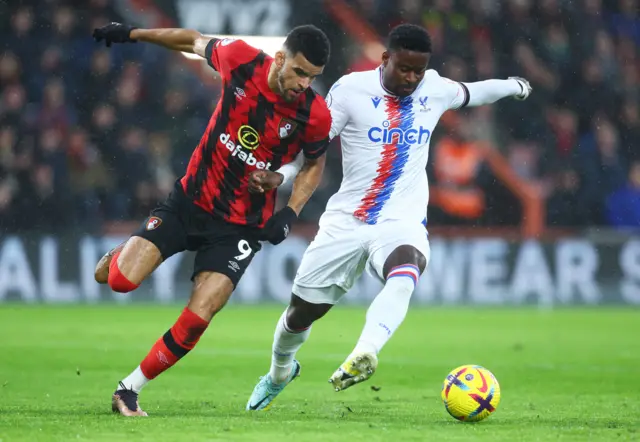 Dominic Solanke of AFC Bournemouth is challenged by Marc Guehi