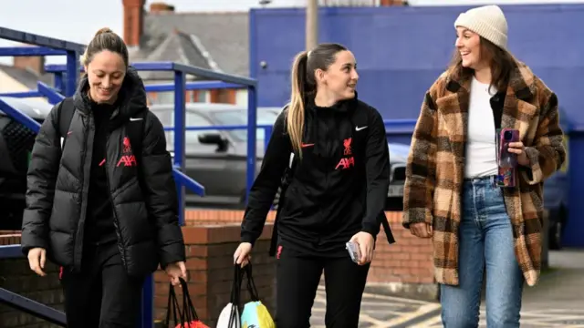 Liverpool players walking in