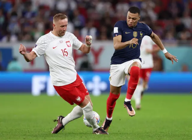 Kamil Glik and Kylian Mbappe