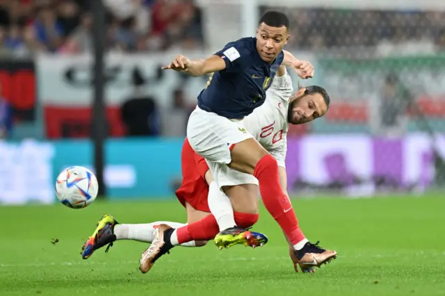 Grzegorz Krychowiak and Kylian Mbappe