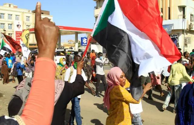 Sudanese protesters march during a demonstration calling for civilian rule