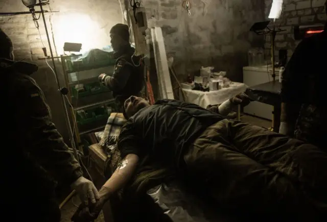 Wounded Ukrainian soldier in field hospital, 3 December 2022