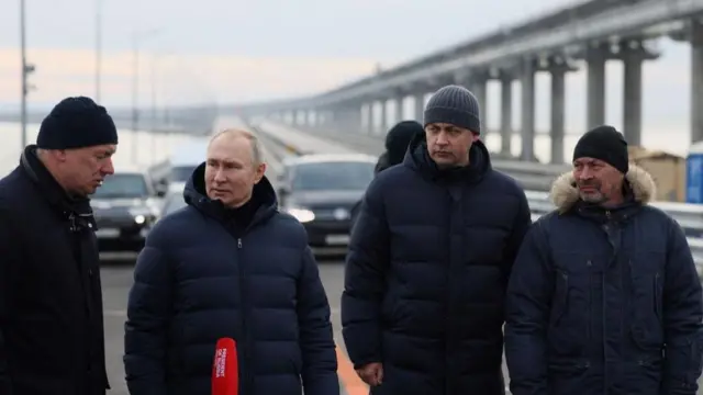 Russian President Vladimir Putin visits the Kerch bridge