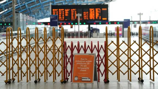 Platforms are fenced off at London's Waterloo station on a strike day