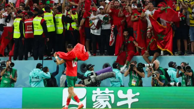 Jawad El Yamiq of Morocco celebrates the team's win over Spain