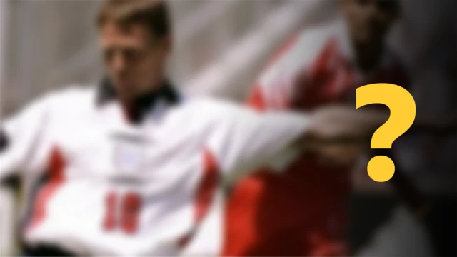 A blurred image of an England player