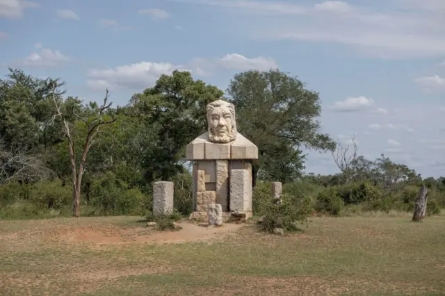 A statue of Paul Kruger is seen at the Kruger Gate of Kruger National Park, on April 3, 2022.