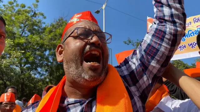 BJP workers celebrate the BJP's performance in Gujarat