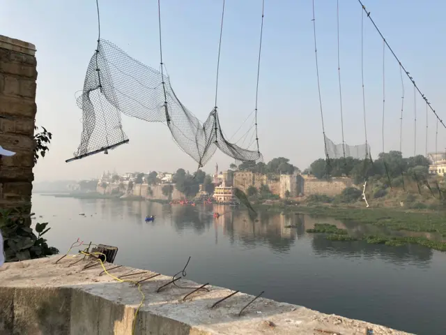 The remains of the bridge in Morbi