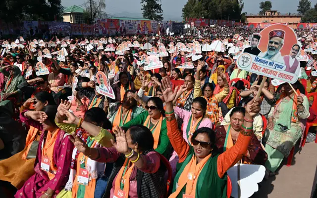 BJP supporters cheer at Prime Minister Narendra Modi's rally in Sundar Nagar, on November 5, 2022 in Mandi, India.