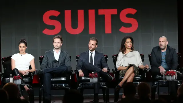 The cast of Suits, pictured in 2014