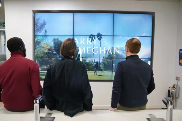 Office workers in London watch the Netflix documentary