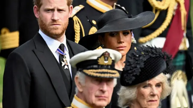 Meghan cries as she, Prince Harry, Queen Camilla and King Charles attend the Queen's state funeral