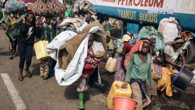 Displaced people flee towards the city of Goma in eastern DR Congo