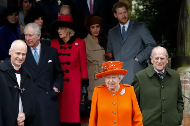 The Prince of Wales, Camilla,the Duchess of Cornwall, Meghan Markle, Queen Elizabeth II and the Duke of Edinburgh leave after attending the Royal Family's traditional Christmas Day church service in Sandringham in 2017