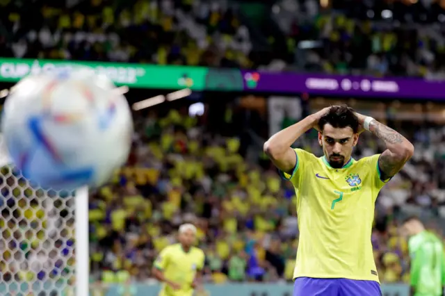 Lucas Paqueta looks on after his shot is saved