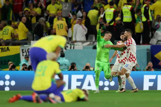 Croatia celebrate as Brazil look on.