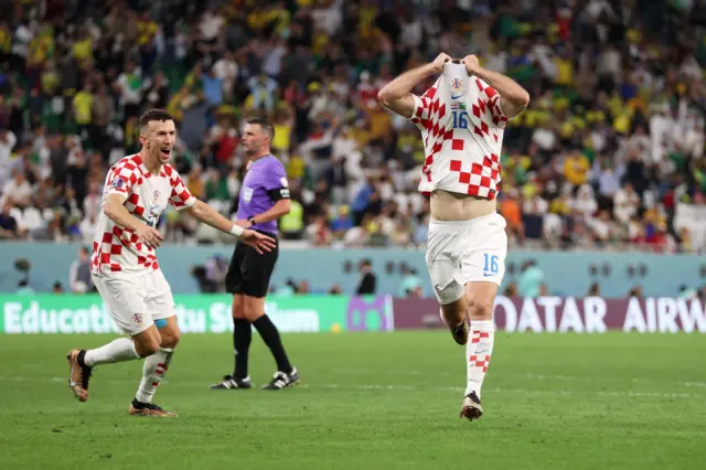 Bruno Petkovic and Ivan Perisic celebrate