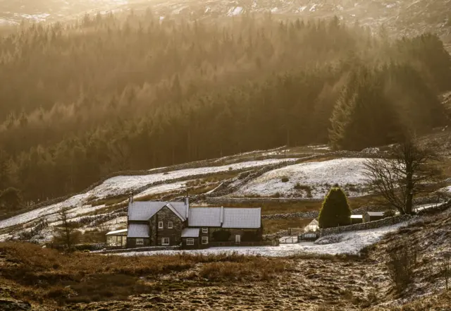 Frost an snow covers a house in the North York Moors National Park